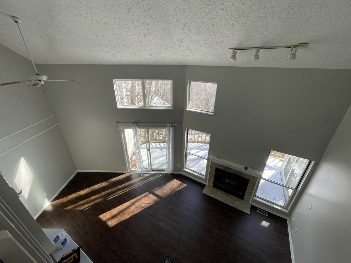 Vaulted living room with freshly painted walls by Cardinal Painting Services